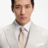 Two-piece slim-fit suit in striped linen and wool Two-piece slim-fit suit in striped linen and wool