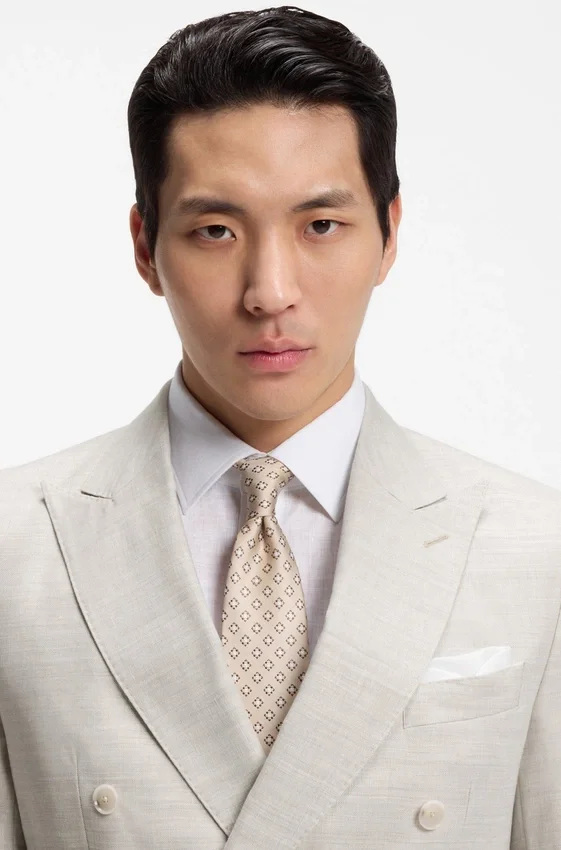 Two-piece slim-fit suit in striped linen and wool Two-piece slim-fit suit in striped linen and wool