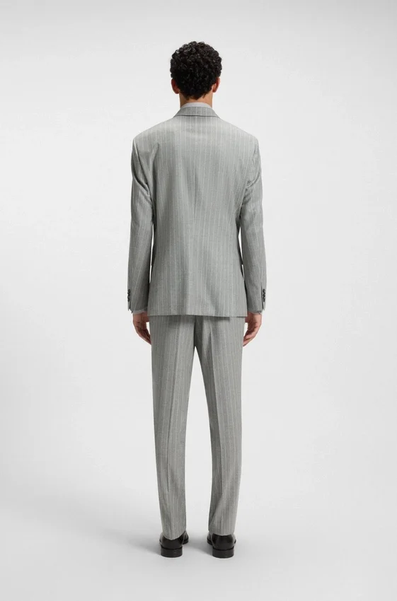 Two-piece slim-fit suit in striped virgin wool Two-piece slim-fit suit in striped virgin wool