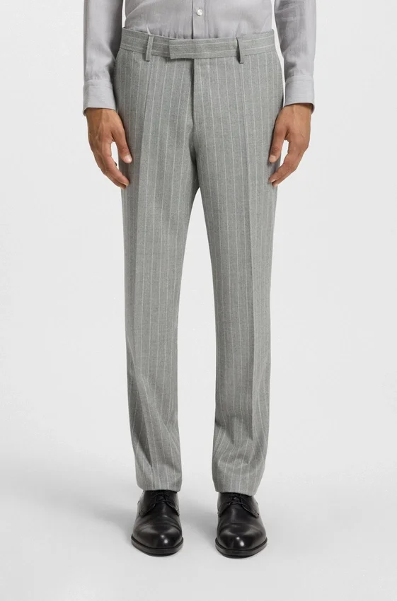Two-piece slim-fit suit in striped virgin wool Two-piece slim-fit suit in striped virgin wool