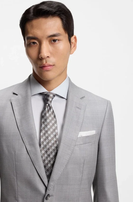 Two-piece slim-fit suit in virgin wool and silk Two-piece slim-fit suit in virgin wool and silk