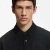 Waffle-structured polo shirt in cotton