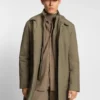 Water-repellent coat with detachable bib