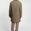 Water-repellent coat with detachable bib