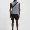 Water-repellent golf vest with decorative reflective details Water-repellent golf vest with decorative reflective details