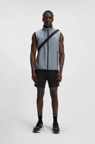 Water-repellent golf vest with decorative reflective details