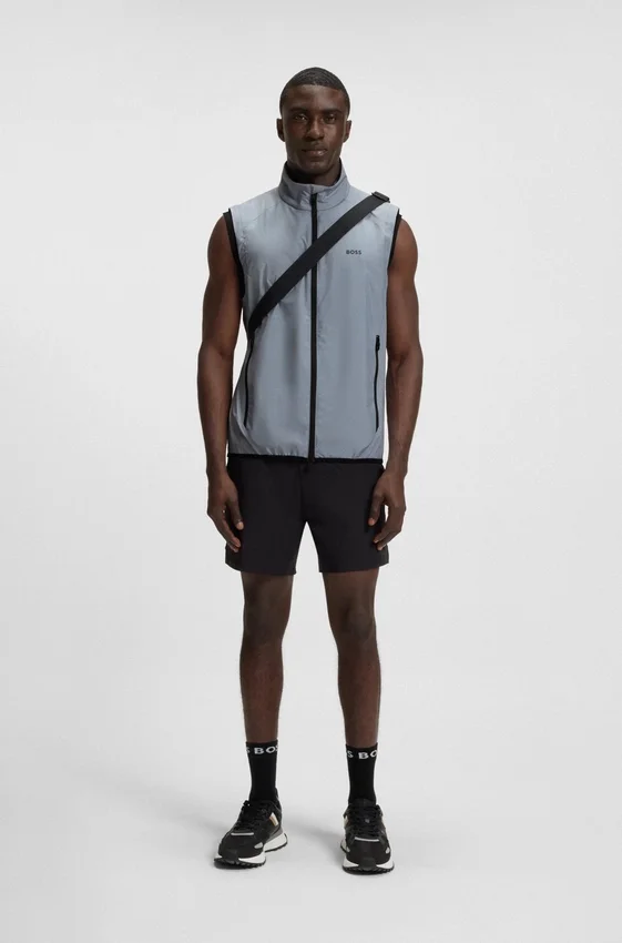 Water-repellent golf vest with decorative reflective details Water-repellent golf vest with decorative reflective details