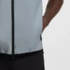 Water-repellent golf vest with decorative reflective details Water-repellent golf vest with decorative reflective details