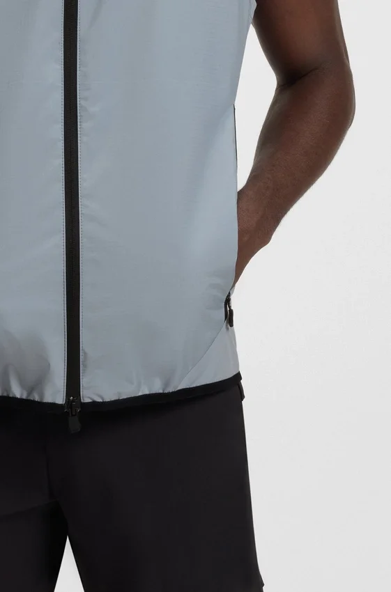 Water-repellent golf vest with decorative reflective details Water-repellent golf vest with decorative reflective details