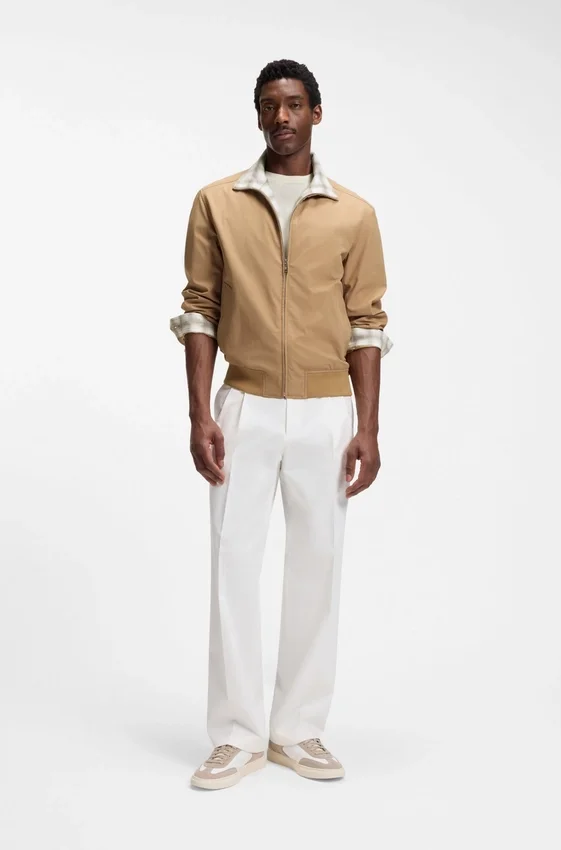 Water-repellent jacket with checkered collar Water-repellent jacket with checkered collar