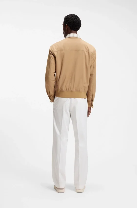 Water-repellent jacket with checkered collar Water-repellent jacket with checkered collar
