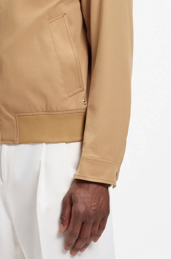 Water-repellent jacket with checkered collar Water-repellent jacket with checkered collar