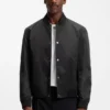 Water-repellent jacket with monogram-patterned sleeves Water-repellent jacket with monogram-patterned sleeves