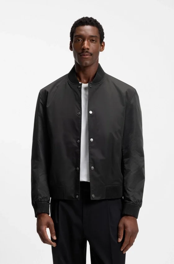 Water-repellent jacket with monogram-patterned sleeves Water-repellent jacket with monogram-patterned sleeves