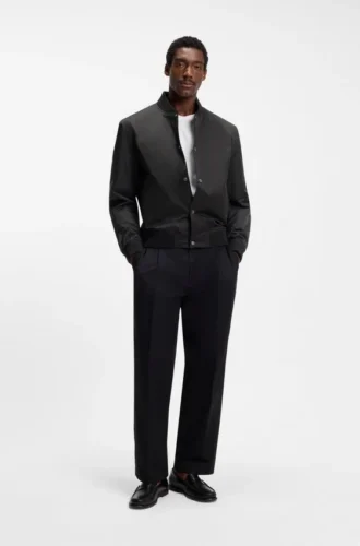 Water-repellent jacket with monogram-patterned sleeves