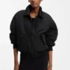 Water-repellent jacket with zipped sleeve pocket