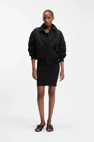 Water-repellent jacket with zipped sleeve pocket