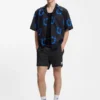 Water-repellent shorts with flag logo