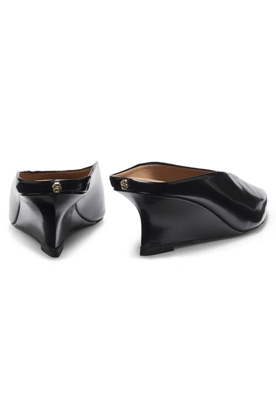 Wedge-heel mules in leather Wedge-heel mules in leather