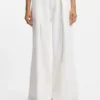 Wide-leg jeans with front pleats