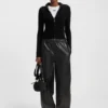Wide-leg parachute trousers in faux leather