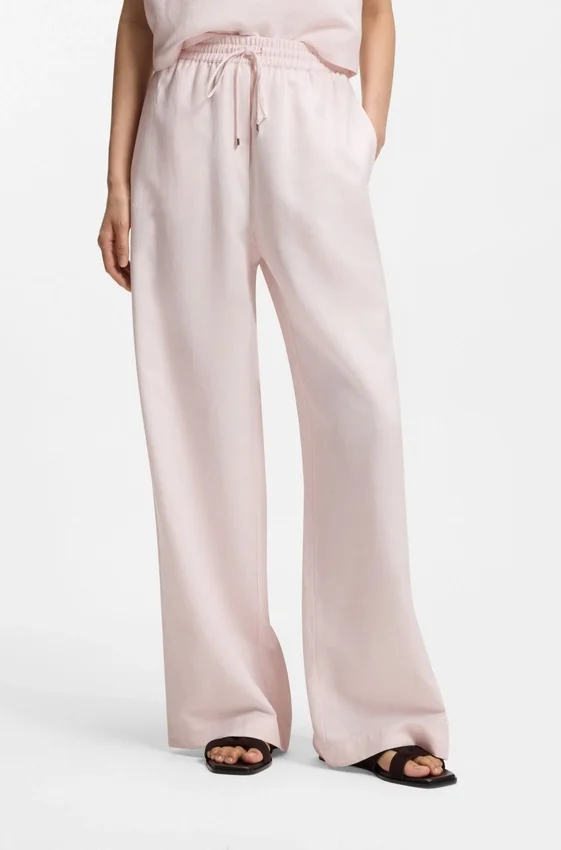 Wide-leg trousers with elasticated waistband Wide-leg trousers with elasticated waistband