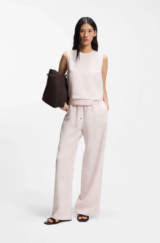 Wide-leg trousers with elasticated waistband Wide-leg trousers with elasticated waistband