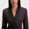Wool dress in a tuxedo style Wool dress in a tuxedo style