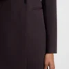 Wool dress in a tuxedo style Wool dress in a tuxedo style