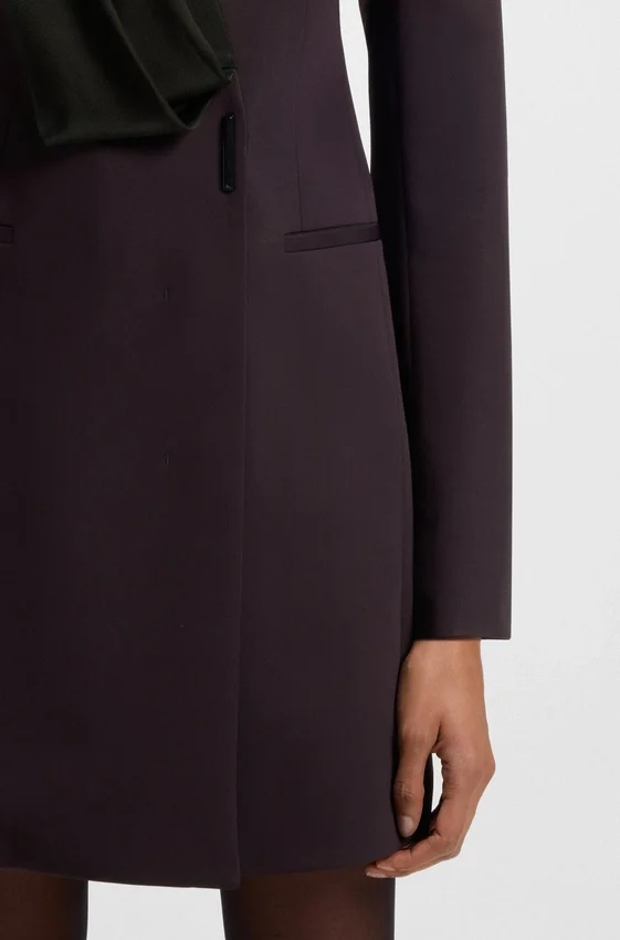 Wool dress in a tuxedo style Wool dress in a tuxedo style