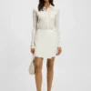 Wrap-front mini skirt in crepe