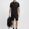 Zip-neck polo shirt in moisture-wicking fabric Zip-neck polo shirt in moisture-wicking fabric