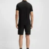 Zip-neck polo shirt in moisture-wicking fabric Zip-neck polo shirt in moisture-wicking fabric