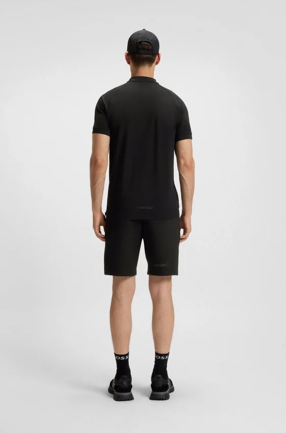 Zip-neck polo shirt in moisture-wicking fabric Zip-neck polo shirt in moisture-wicking fabric